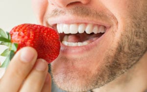 Man Eating Strawberry