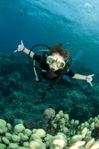 teenager scuba diving